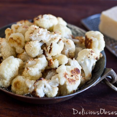 Roasted Cauliflower with Olive Oil, Garlic and Parmesan // deliciousobsessions.com